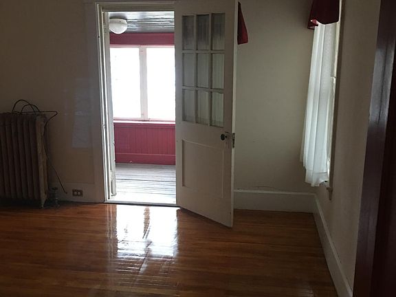 Bedroom with walk-out porch