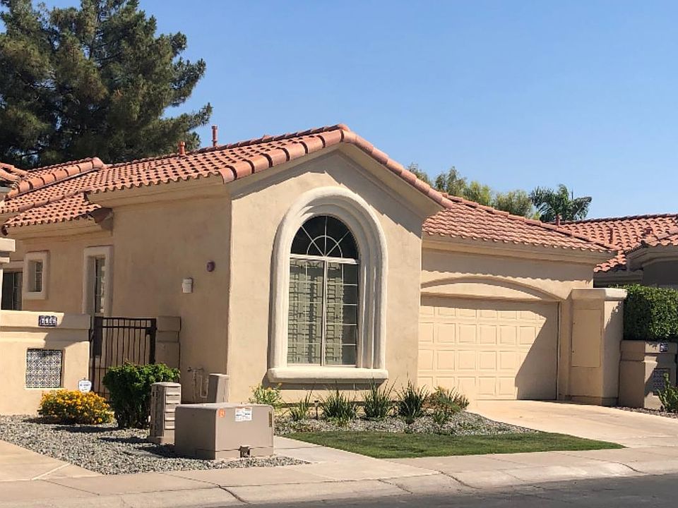 Newly landscaped front, courtyard entry, and patio