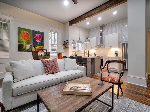 Chef's kitchen overlooking living room
