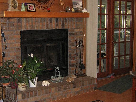 Fireplace French doors to screened porch