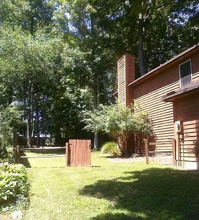 Side Yard - yard is completely fenced in.