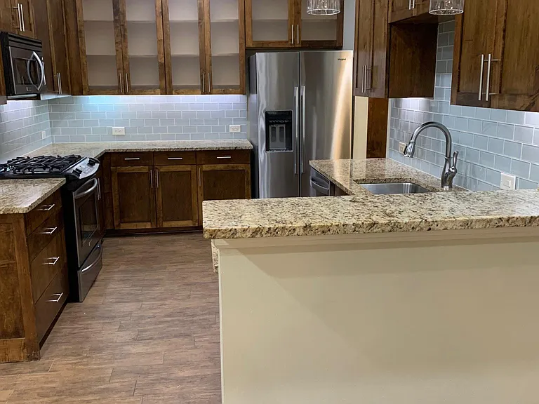 Full kitchen with stainless steel appliances