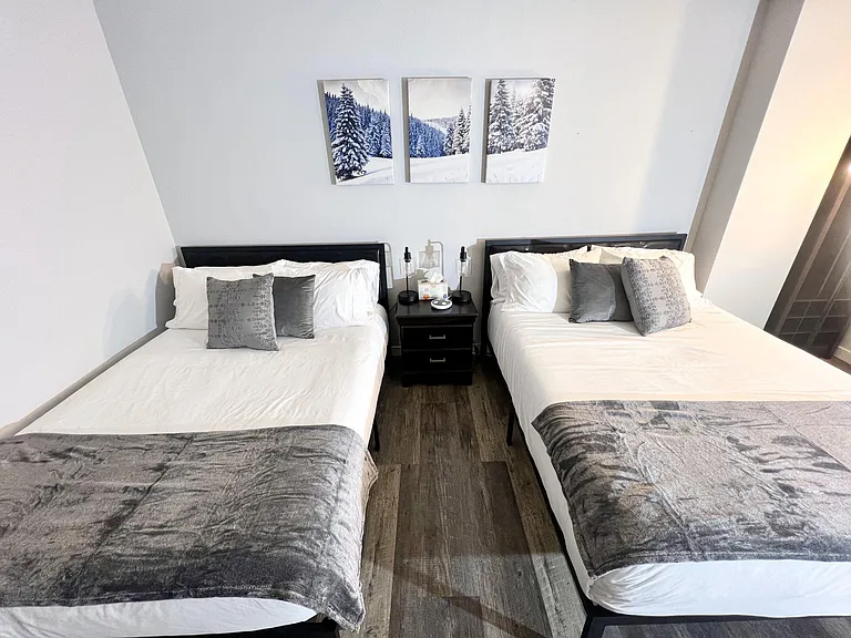 Bedroom 2: 2 Queen Beds, 55 in LED TV, Arcade (2nd floor)