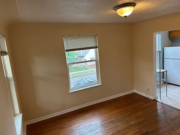Livingroom with gorgeous hardwoods. View from the closet storage.