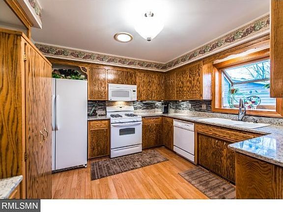 Great looking kitchen with upgraded granite counter tops, sink, appliances and window.