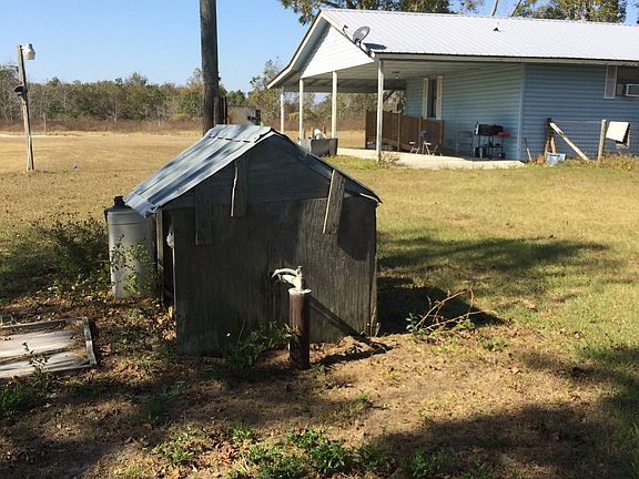 Well/Carport/back of house