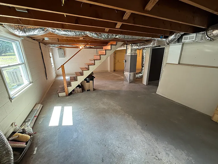 Large basement offers more living space plus windows offer natural light