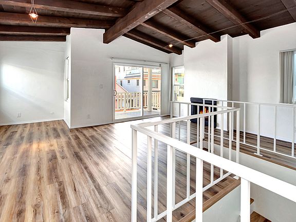 Living/dining Room onto deck. Desk nook