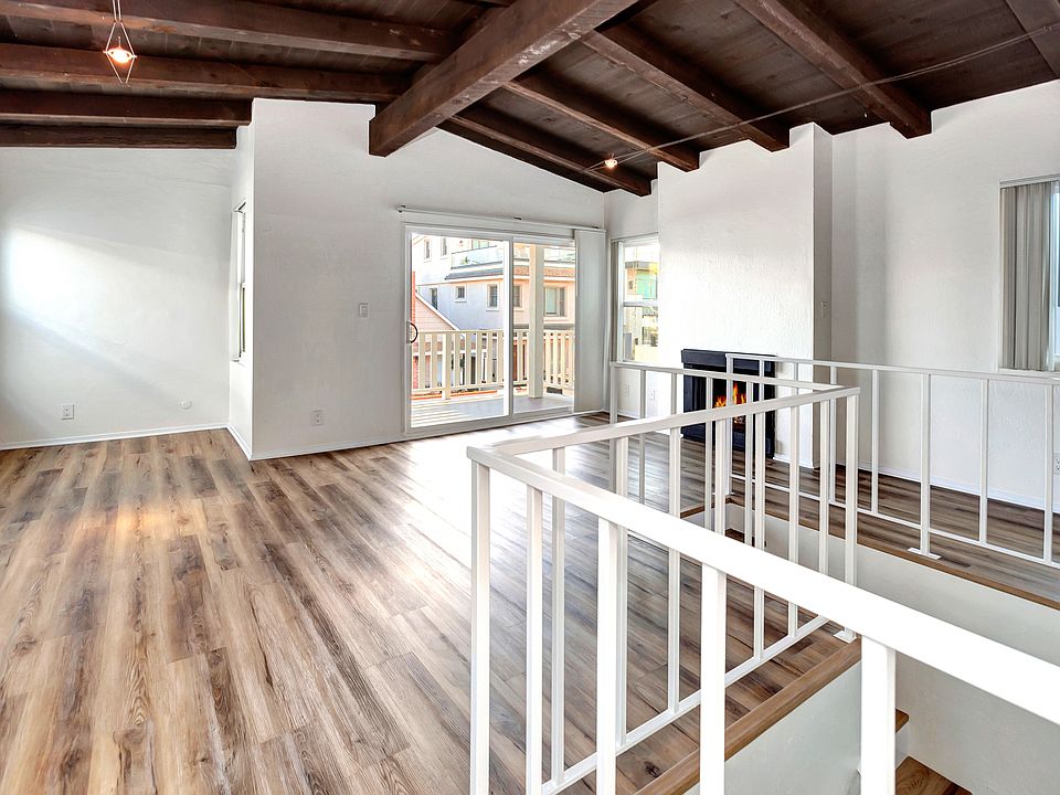 Living/dining Room onto deck. Desk nook