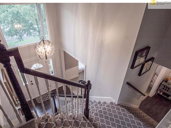 Entryway showing double stairs