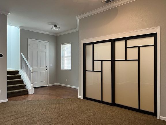 Custom trackless sliding doors to close of the office for privacy when needed