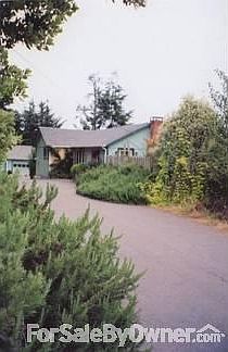 Main home
						:
						Driveway view from Airport Road