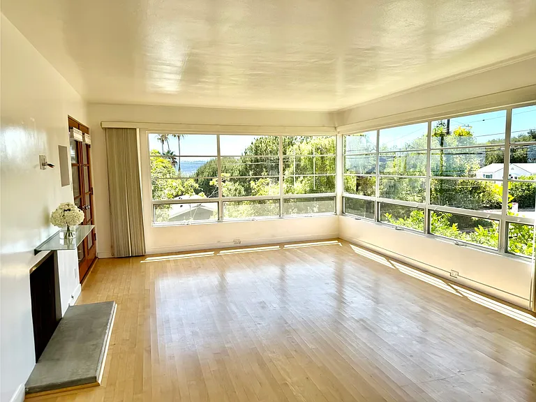 Huge Living Room with wood Floors & Gas Fireplace