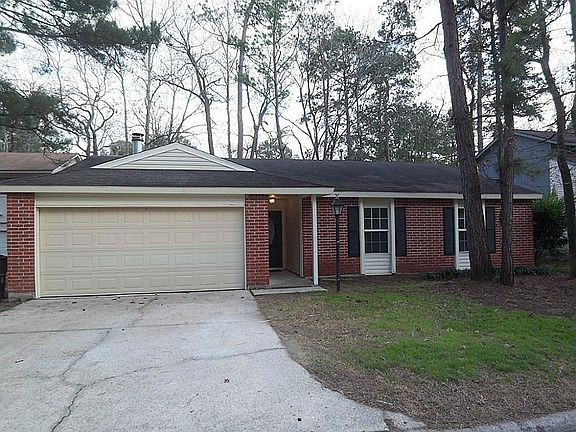 This one story has a two car garage and covered entry.