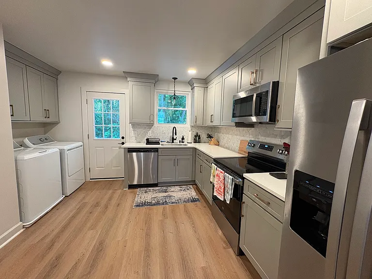 Fully stocked kitchen with everything you could need. Refrigerator with in-door ice and water.