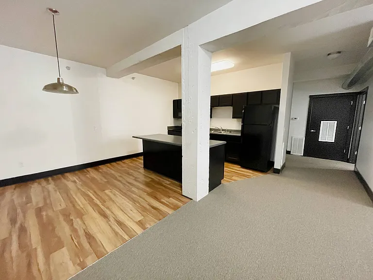Kitchen and unit entrance at 3 Points Loft.