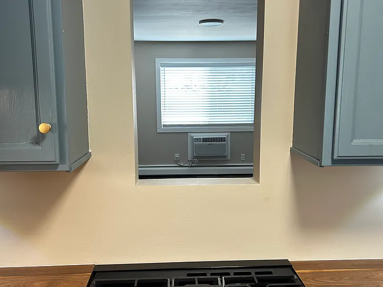 Window above range before tile was installed.