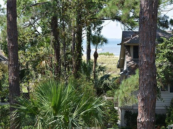 View of beach from front deck chairs.