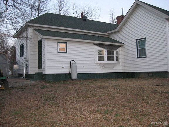 outside back of home