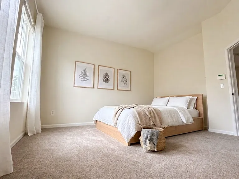Master Bedroom - Photo digitally staged for visual context. Swipe to see empty space!