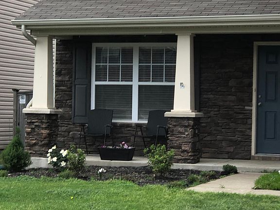 Nice front porch with 2 chairs included.