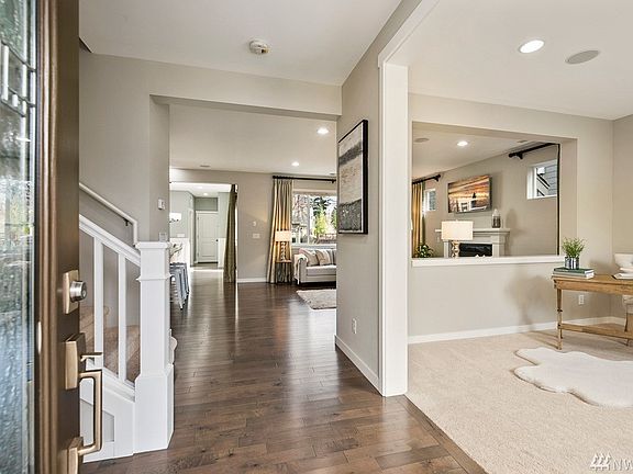 Designer finishes throughout! Sleek hardwood flooring on the main level.