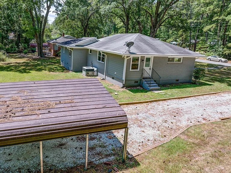 2-Car Covered Parking and Driveway/Side Entrance