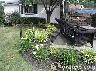 Back yard with view of garage