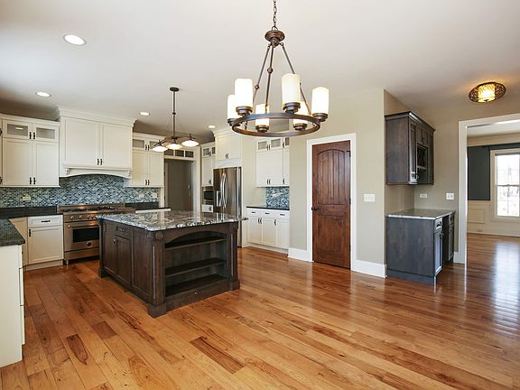 Kitchen (view of butler's panty and dining room)
