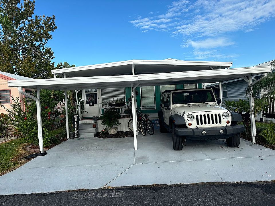 front of house with carport