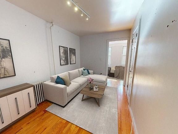 2nd image of 125 E 7th St APT 4E
