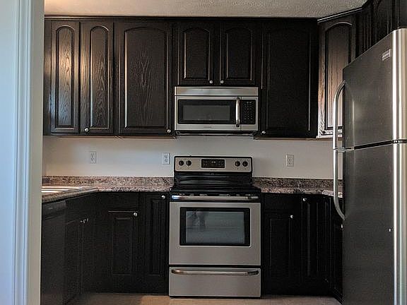 All new cabinets and appliances. Glass cooktop. Built in