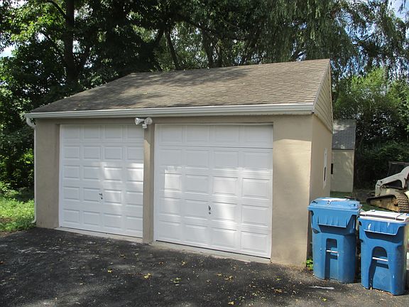 New Stucco And Garage Doors