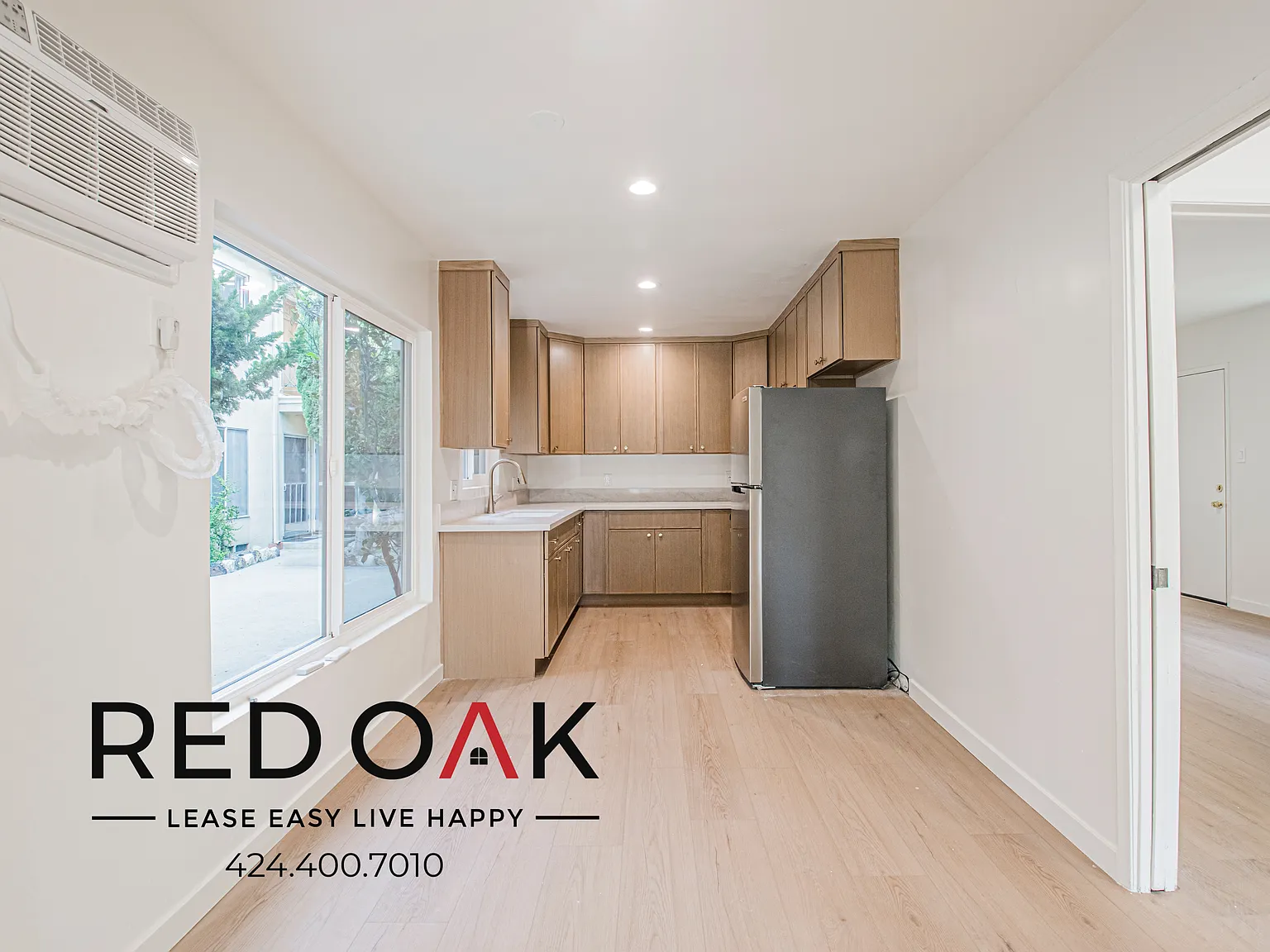 Newly Remodeled Two Bedroom with Spacious Open Floor Plan, On-Site Laundry, and Available Parking... — Photo 2
