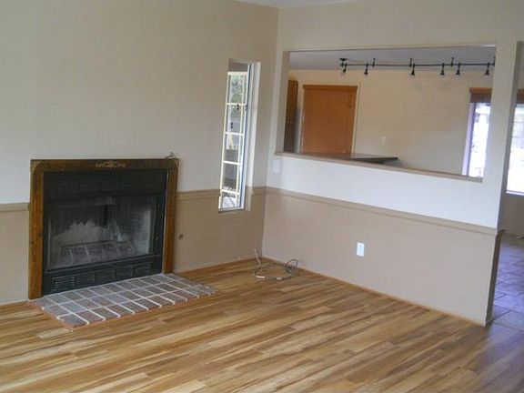 Living room with hickory laminate floor.