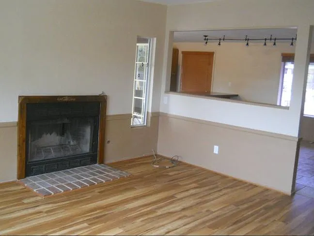 Living room with hickory laminate floor.