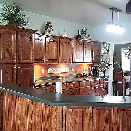 Kitchen has lots of cabinet 