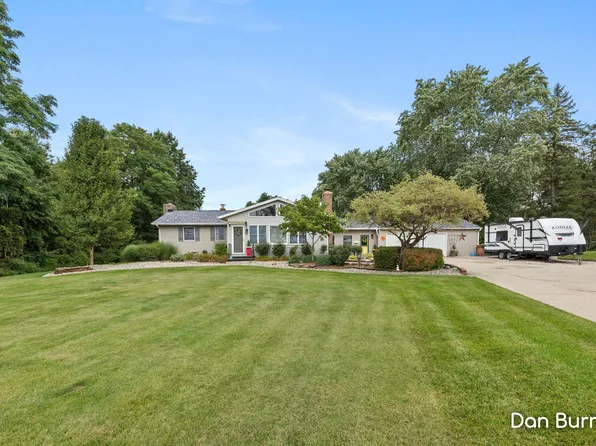 10679 Keystone Dr NE, Ada, MI 49301