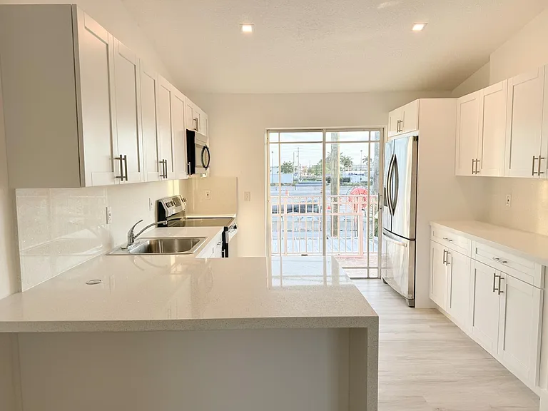 10903 W Okeechobee Rd #202A — Photo 15