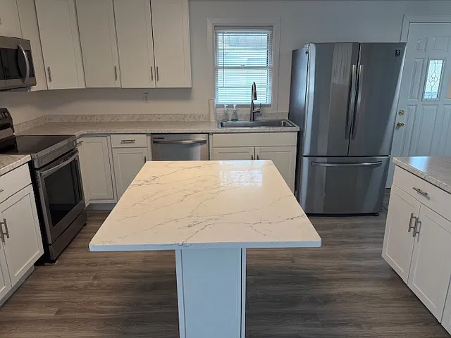 Quartz island/ large stainless sink/
