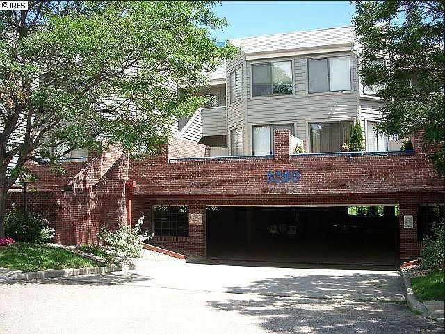 Looking at the front of the unit, also parking underneath the building.