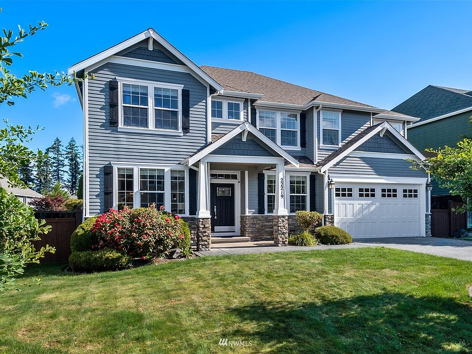 Beautiful, stately residence in the desirable & convenient White River Estates neighborhood. >