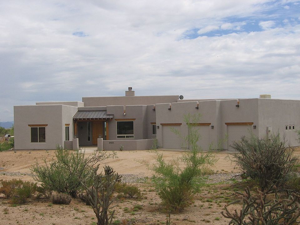 Custom w/ 3 car garage.
