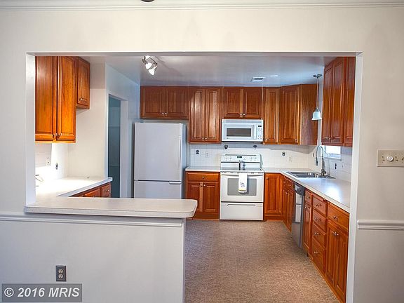 Kitchen opens to Dining Room for easy entertaining
