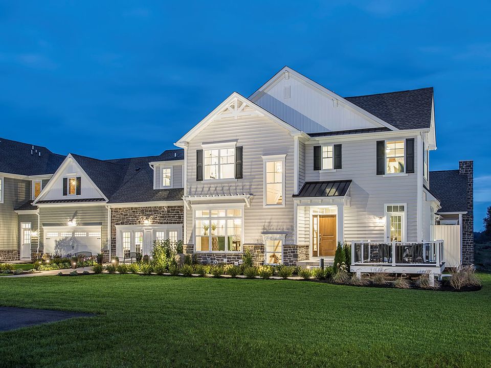 New carriage homes adjacent golf course greens and preserved farmstead