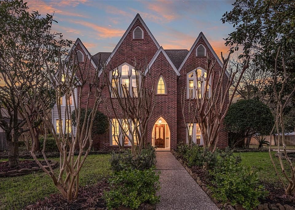 Beautifully updated 4/3.5 features master down, game room up, inviting living spaces, and cathedral ceilings on the second floor.
