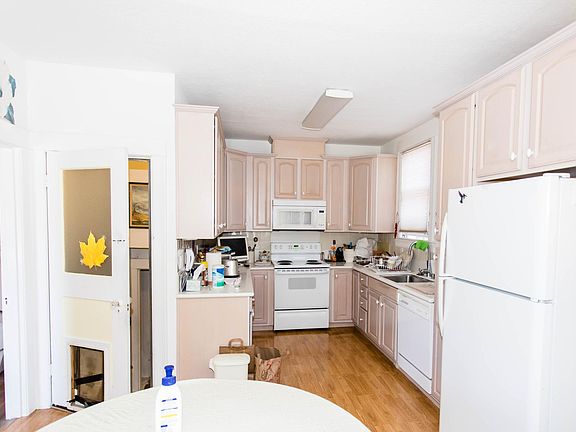 Kitchen with a bay window looks out to the garden