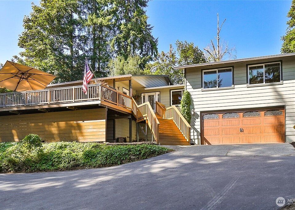 "Step into this beautifully updated home featuring an open floor plan, gleaming hardwood floors, and modern touches throughout.>