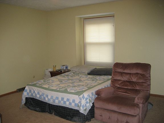 5th image of 8615 Hickerylane Ave NW