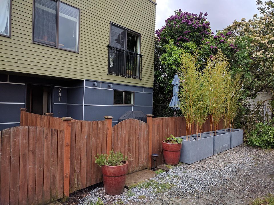 Private patio entry on quiet alley, trees all taller than this photo shows for more privacy